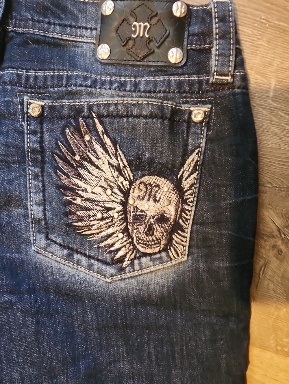 Miss Me Dark Blue Jeans with Embroidered Winged Skull Pocket